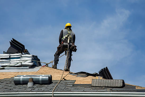 Professional Roofing technician working in Woodbine, NJ